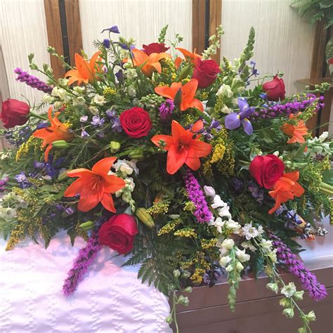 Half Casket Spray With Vibrant Flowers Casket Flowers Funeral Floral