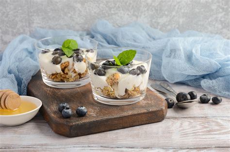 You can still use the same flavor of yogi tea, or you can match the flavor to your desired fruit filling. Healthy Dessert With Homemade Granola, Yogurt And Blueberries Stock Photo - Image of cooking ...