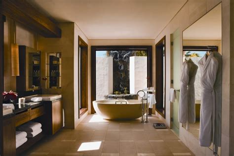 Kama deva bathtub is designed by the indonesian interior designer marina pandunata of bati bali the designer has hollowed the rock to give it the shape of a bathtub. luxury-modern-hotel-bathrooms-peninsula-shanghai-bathroom ...
