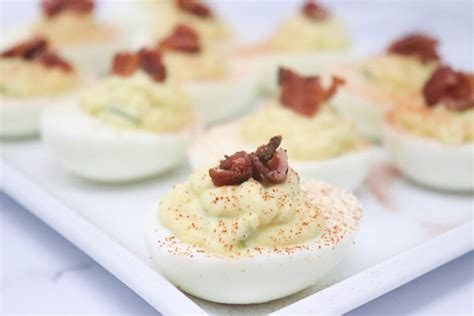 Add the yolk filling back into the egg halves using a spoon. Jalapeño Deviled Eggs Topped With Bacon - Simply Low Cal