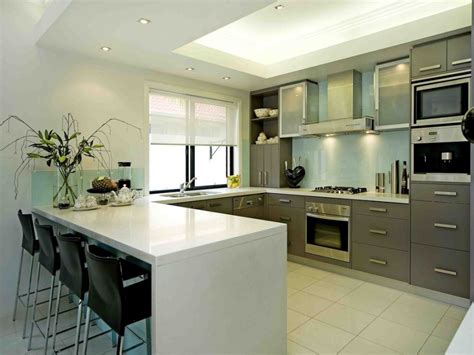 This kitchen layout has three walls of cabinets or appliances. How to Make A Lot Better U Shaped Kitchens Design Ideas
