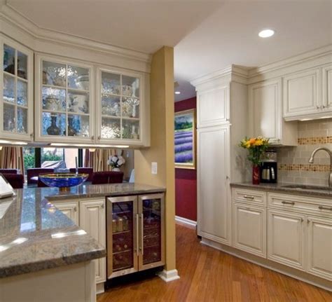 White glass front kitchen cabinets. Glass front kitchen cabinets for a fashionable look in the ...