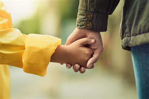 Always Hold Hands When Crossing The Road Stock Photo Download Image