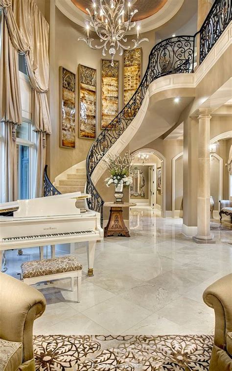 The talented designers and architects of the staircases that follow have made going from one floor to another a truly transcendent experience. This luxury Foyer With Straight Staircase Leads Into The ...