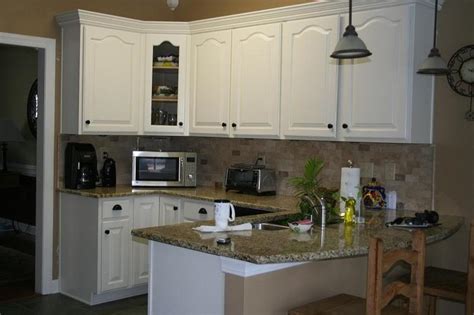 How are your painted kitchen cabinets holding up now that it's been almost 5 years? Painting Kitchen Cabinets White | hac0.com