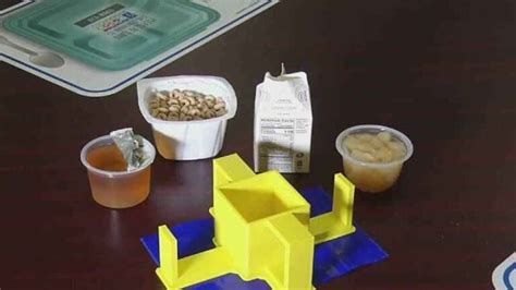 St Paul High School Senior Creates Device To Help 2nd Grader Open Milk