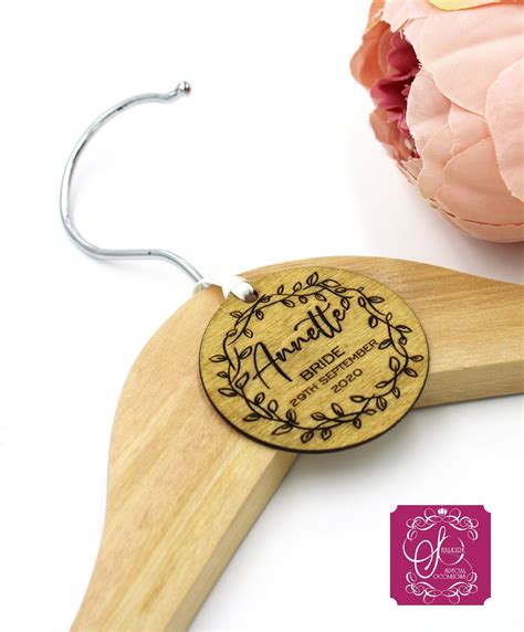 Wooden Engraved Personalised Hanger Tags With Floral Detail By