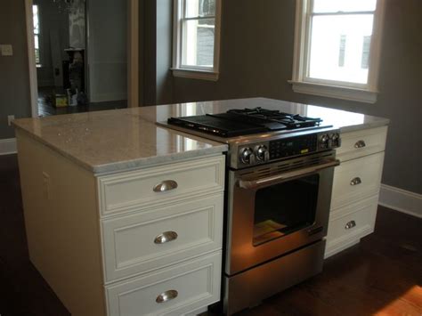 For adequate legroom, make sure there's a clearance of 9 to 13 inches between the knees and the bottom of the counter. downdraft drop in stove in island | Renovating a Historic ...