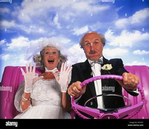 Bride And Groom Senior Citizens Motoring Cabriolet Pink Detail Laugh Joy Gesture