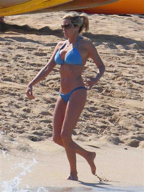 Camille Grammer Wears A Blue Bikini At The Beach In Hawaii