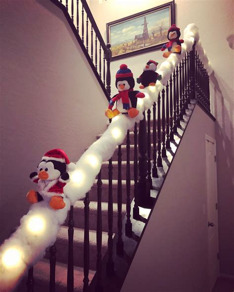 Sliding Penguins On Banister Christmas Decorations For Kids Fun