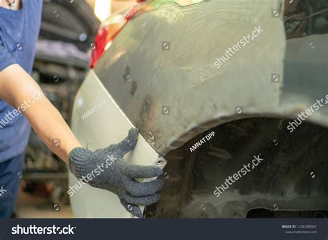 Auto Repairman Worker Automotive Industry Examining Stock Photo