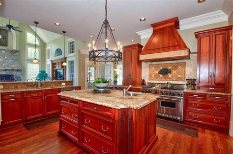 Many online sources are there to give ideas and inspirations. 23 Cherry Wood Kitchens (Cabinet Designs & Ideas ...