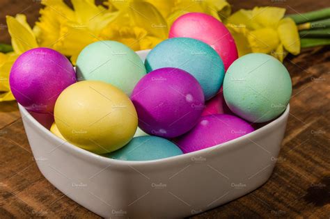 Bowl Of Easter Eggs With Daffodils ~ Holiday Photos ~ Creative Market