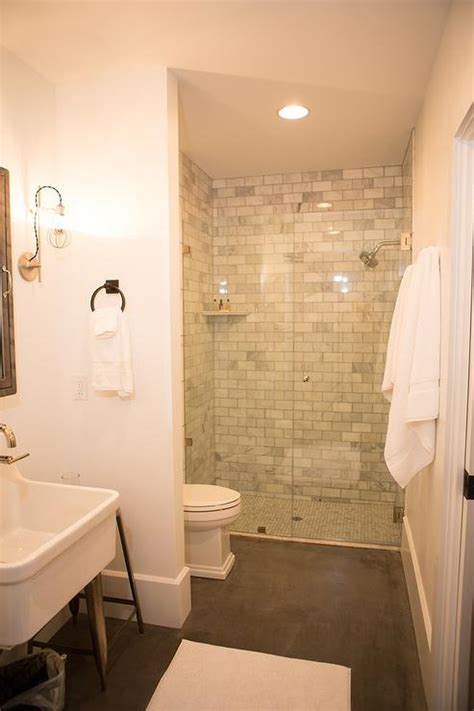 Thank you for your interest in our tile. Shower with Marble Subway Tiles and Corner Ledge Shelf ...