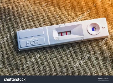 Hcg Pregnancy Test Result Positive Pregnancy Stock Photo 727952425