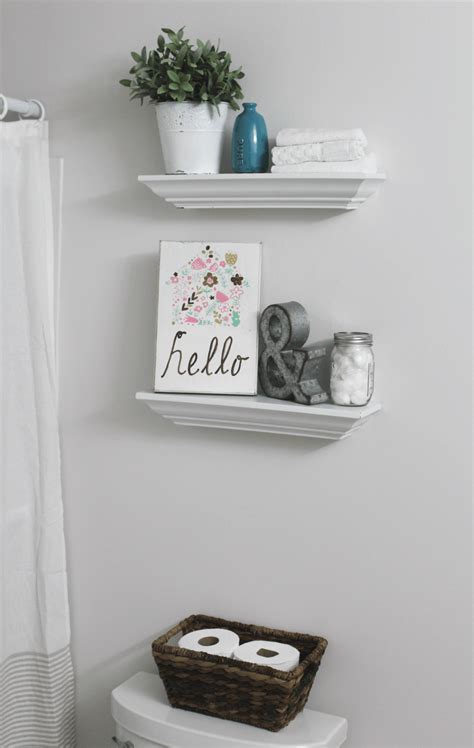 Over the toilet storage ideas can help even the tiniest apartment bathroom to be smartly organized. Bathroom shelf and over the toilet - At Home With Zan