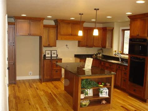 Country, casual or even classically styled homes. dark cabinets, hickory floors | For the Home | Pinterest