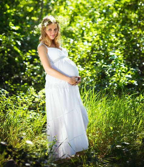 Pregnant Woman In Green Forest Stock Photo Image Of Motherhood Blond