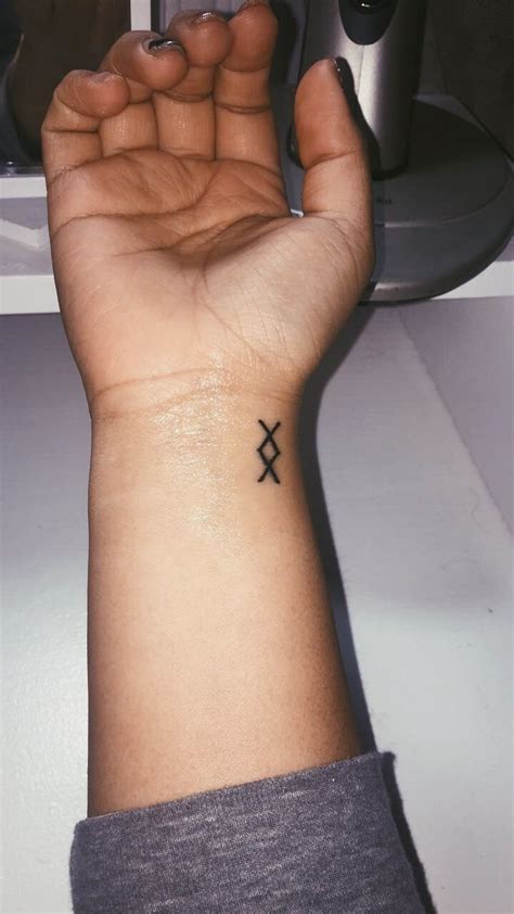 Finally decided to get my first tattoo it's so small but the meaning
