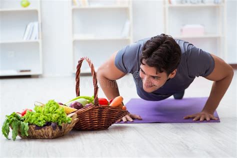 The Man Promoting The Benefits Of Healthy Eating And Doing Sports Stock Photo Image Of