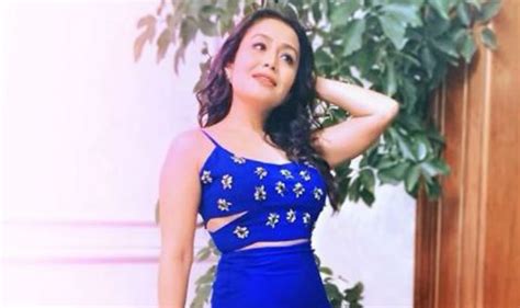 Singing Sensation Neha Kakkar Looks Smoking Hot In Blue Crop Top And Thigh High Slit Skirt In