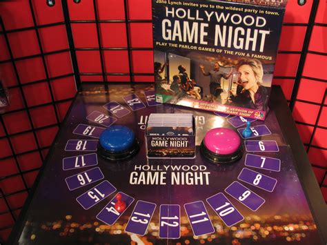 Trivia, charades, and drawing over video with your friends. Hollywood Game Night Board Game | Purple Pawn