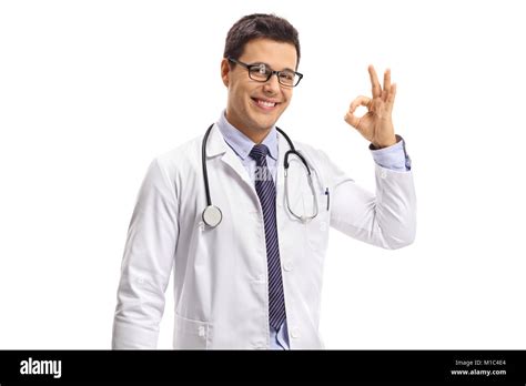 Doctor Making An Ok Hand Gesture Isolated On White Background Stock Photo Alamy