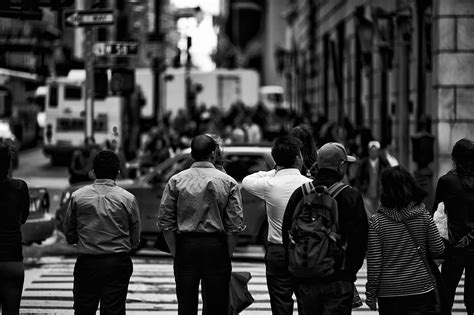 Crowd of anonymous people walking on city street | FUJILOVE MAGAZINE