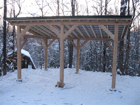 The roof structure is built on a sturdy 2×10 rafter structure, every 24″. Rave Projects: Post and Beam carport/shed/boat storage Dec 2010