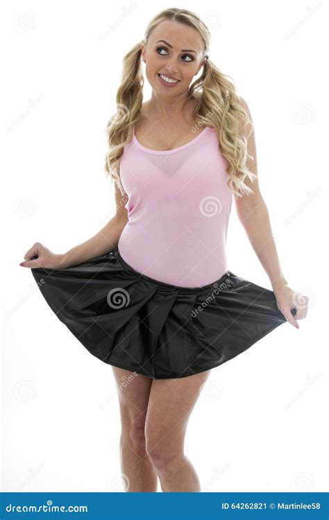 Beautiful Young Caucasian Woman Lifting Up Her Mini Skirt Smilin Stock