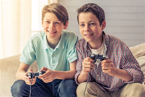 Royalty Free Kids Playing Video Games Pictures Images And Stock Photos