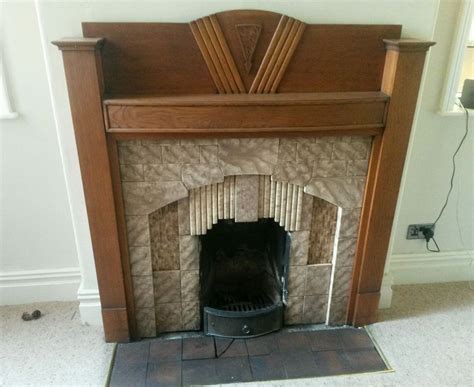 Crisp, clean, classic 1930s fireplace with a strongly vertical appearance. Art Deco Fire Surround and Tiles 1933 | Art deco fireplace ...