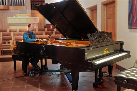 Dual Keyboard Piano And Orchestra Combine At Unique Birch Creek Event