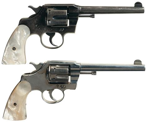 Collectors Lot Of Two Colt Double Action Revolvers With Pearl Grips A