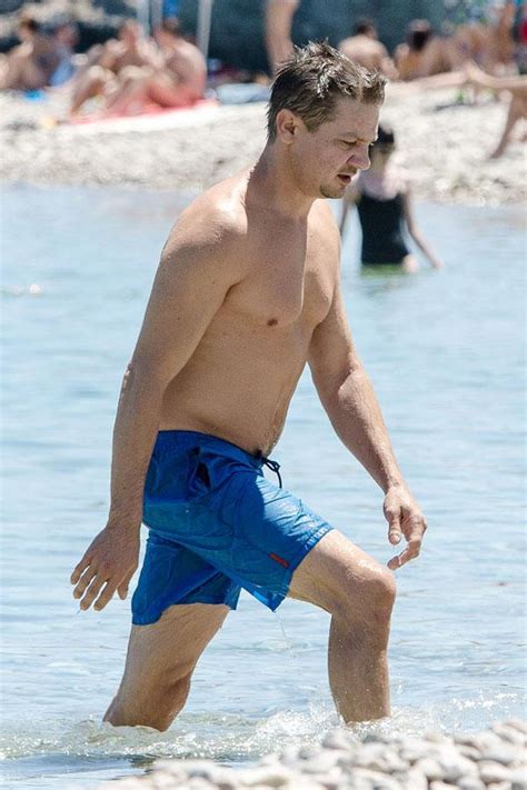 Sexy Dad Body Jeremy Renner Reveals His Strong Physique On The Beach With A Hot Brunette