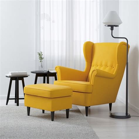 STRANDMON Armchair - Skiftebo yellow - IKEA The ability to raise your feet on the footrest is ideal for those who may need to keep circulation flowing and foot swelling down.