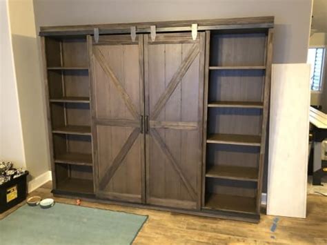 Maybe you would like to learn more about one of these? Wood Farmhouse Barn Door Bookcase (With images) | Guest ...
