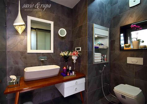 A tiny bathroom is usually equated with cramped space, but with clever small bathroom tile ideas, a small bathroom can get a dreamy design. Design by savio michael | Modern bathroom design, Bathroom ...