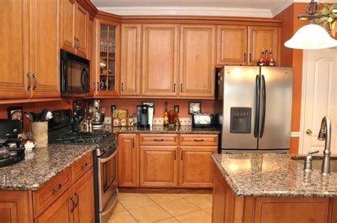Honey spice brings out the warm tones in wood, but the exact look and shade of the wood changes with the species chosen. oak cabinets quartz countertops - Google Search | Honey ...