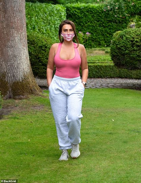 lauren goodger flaunts her ample cleavage in a plunging vest top