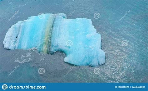 Large Floating Iceberg In Blue Water Alaska Stock Image Image Of