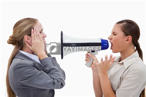 Manager Yelling At Her Employee Through A Megaphone By Wavebreakmedia
