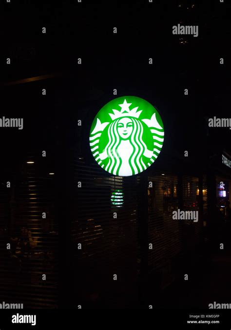 Illuminated Starbucks Sign Stock Photo Alamy