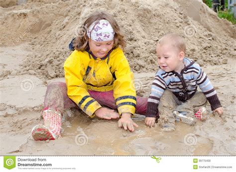 Kids In The Mud Stock Photo Image Of Young Kids Slush
