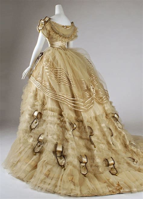 The skirt is three rectangles of fabric, pleated and cartridge pleated to a waistband. The Jewelry Lady's Store: Emile Pingat Ball Gown c. 1860