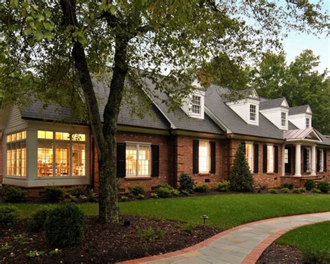 The brick walk reinforces the connection of the house to the street and neighborhood. Red Brick And Vinyl Siding Home Design Ideas, Pictures ...