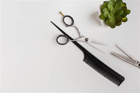 Premium Photo Hair Scissor And Comb Close Up