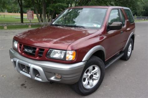 When i get on the interstate and go above 70mph, the i have a 99 isuzu amigo (which is now the rodeo sport). Buy used 2002 Isuzu Rodeo Sport Hard Top Convertible 1 ...