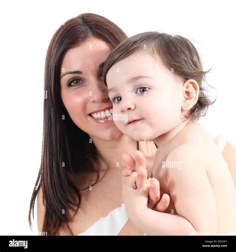 Portrait Of A Beautiful Mother Holding Her Daughter Isolated On A White
